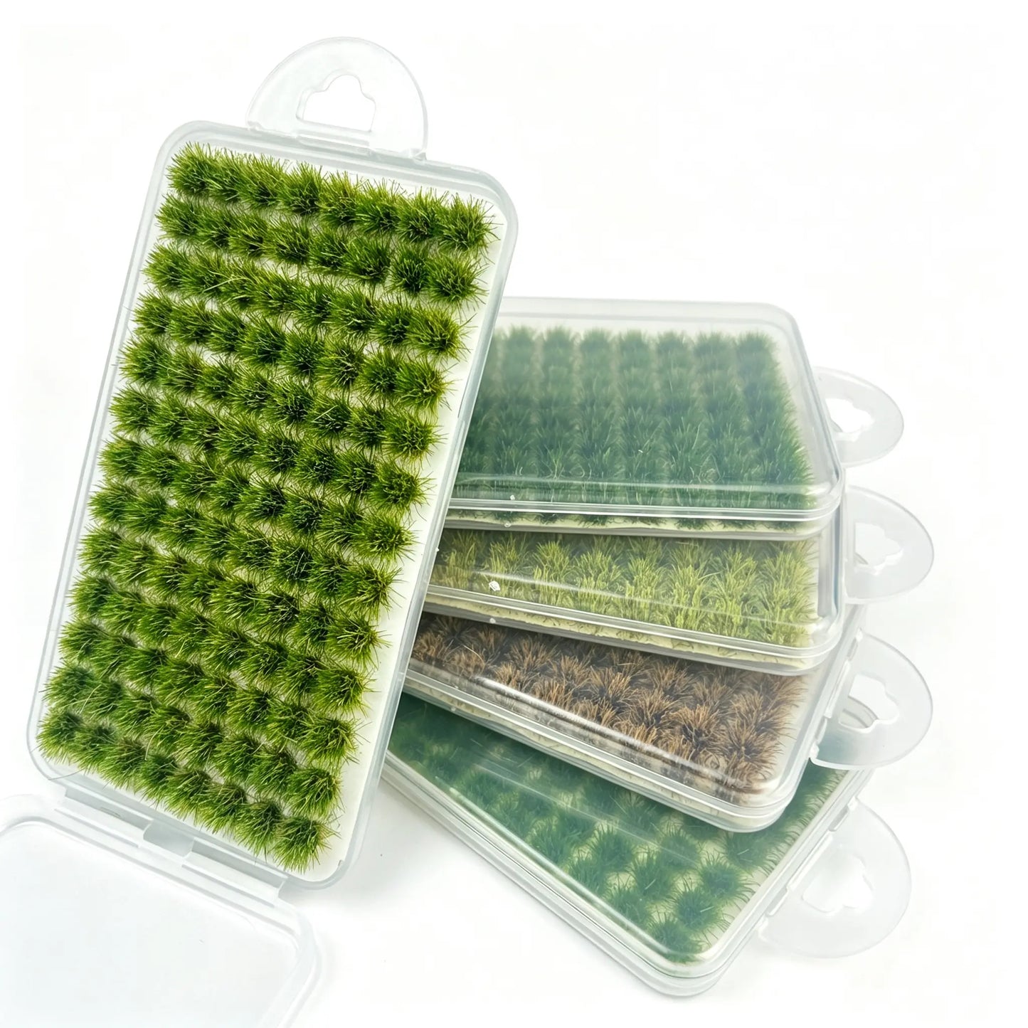 Pack of 104 self-adhesive static grass tufts sheets, 10.8cmx6cm overall size with 3 mixed color mini foliage clumps stacked display, close-up detail shot, static grass tufts, miniature diorama supplies, wargame terrain material, model railway grass, self-adhesive grass clusters, scale model scenery, warhammer terrain, hobby craft grass
