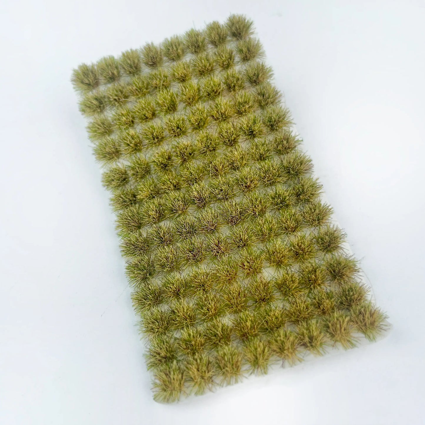 Pack of 104 self-adhesive static grass tufts sheet, 10.8cmx6cm overall size with spring light green mini foliage clumps, close-up detail display, static grass tufts, miniature diorama supplies, wargame terrain material, model railway grass, self-adhesive grass clusters, scale model scenery, warhammer terrain, hobby craft grass