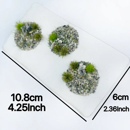 Tweezers peeling self-adhesive gravel rock grass tuft clump, removable rocky miniature foliage sheets for custom DIY wargame base, diorama terrain and scale model scene building