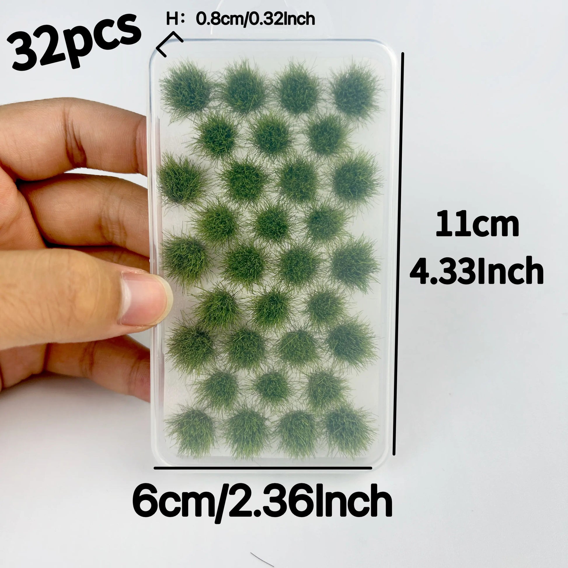 Pack of 32 self-adhesive dark green static grass tufts sheet, 11cmx6cm overall size with 0.8cm tall dense mini foliage clumps, close-up detail for wargame terrain, diorama landscape and scale model train scenery craft