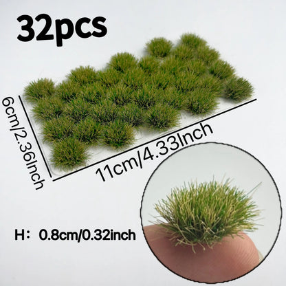 Hand-held display of 32 self-adhesive dark green static grass tufts sheet, 11cmx6cm with 0.8cm tall mini foliage clumps, realistic terrain clumps for wargame bases, diorama and scale model railway scenery