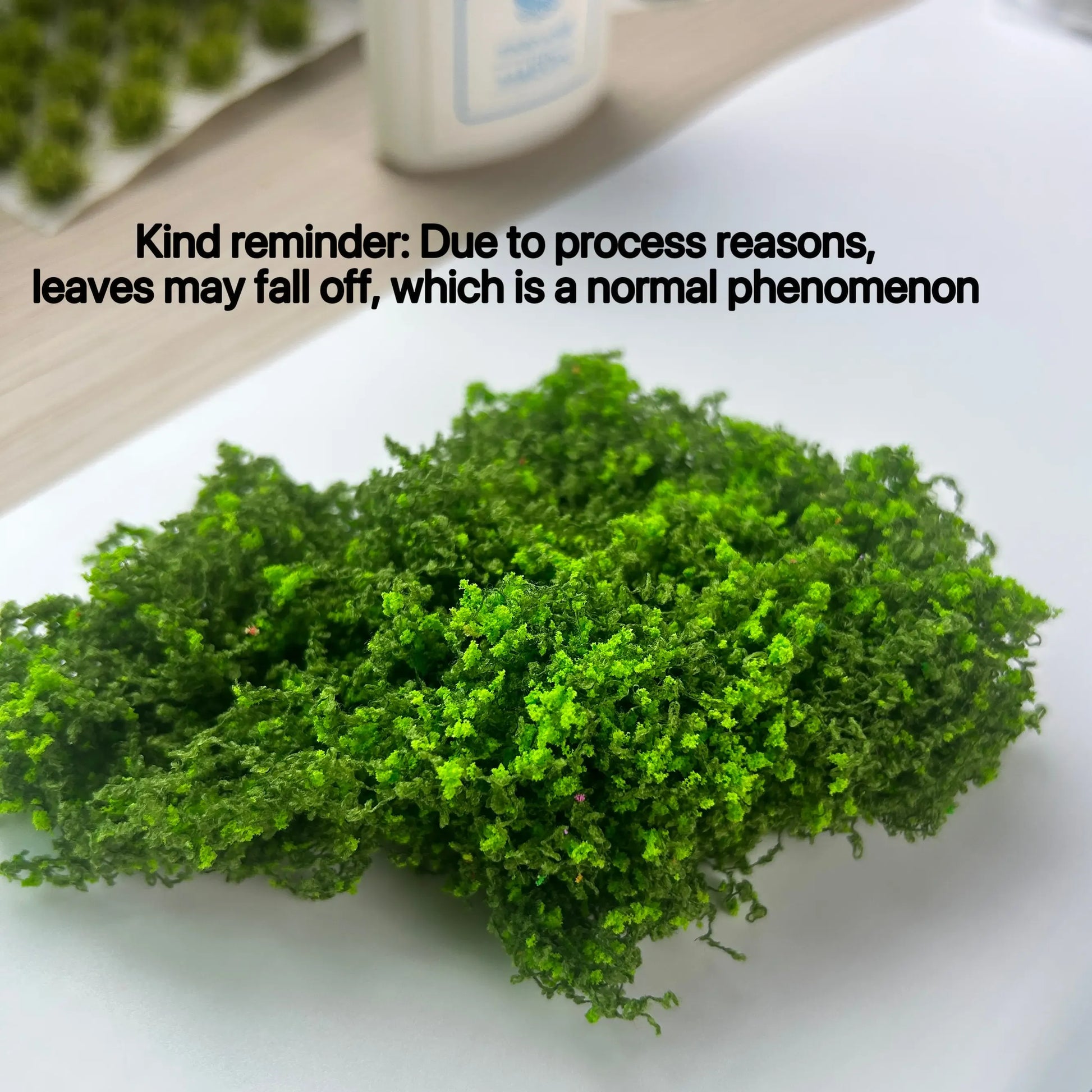 Dark green, dense artificial moss clump, realistic miniature foliage for tabletop wargame terrain, military diorama base, and model railroad scenery.