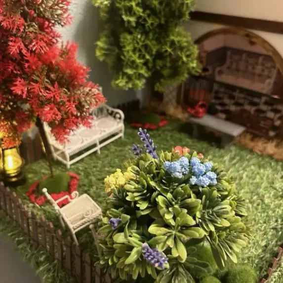 Delicate miniature backyard garden diorama scene decorated with soft green tuft grass sheets, cottage landscape terrain for dollhouse, architectural scale model and decorative hobby scene building