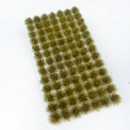 Mixed warm pale brown and autumn yellow static tuft grass sheet with natural seasonal gradient color, self-adhesive model grass mat for realistic wilderness, war gaming terrain and diorama base decoration