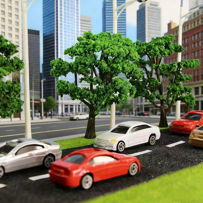 Urban city street diorama scenery with green model trees and 1/150 scale mini static car decorations