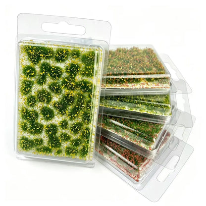 Mixed colors self-adhesive static grass tufts sheet with peelable individual grass clumps, realistic static grass mat miniature lawn terrain in deep green, orange and yellow tones for scale model building, wargame tabletop base, railway layout scenery and diorama craft hobby supplies