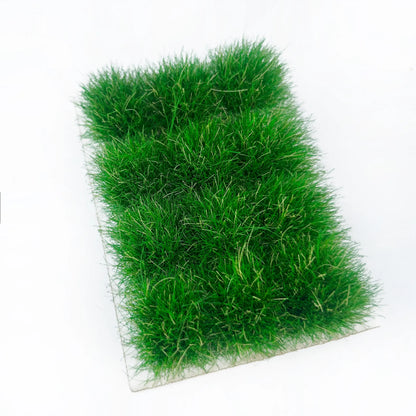 Self-adhesive deep emerald green miniature grass tuft sheet with complete size measurements marked, for lush woodland diorama and wargame terrain craft reference