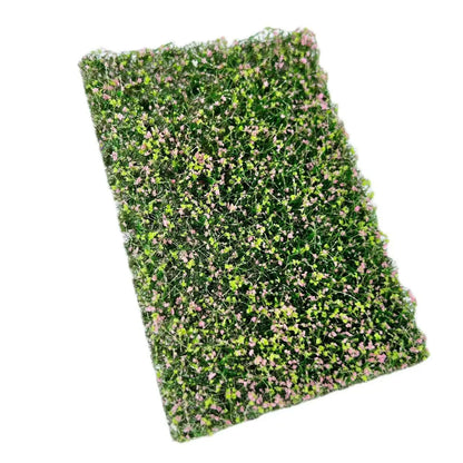 Rectangular artificial miniature grass mat with lush green base and countless tiny white flowers, top full view for DIY diorama micro landscape terrain model layout