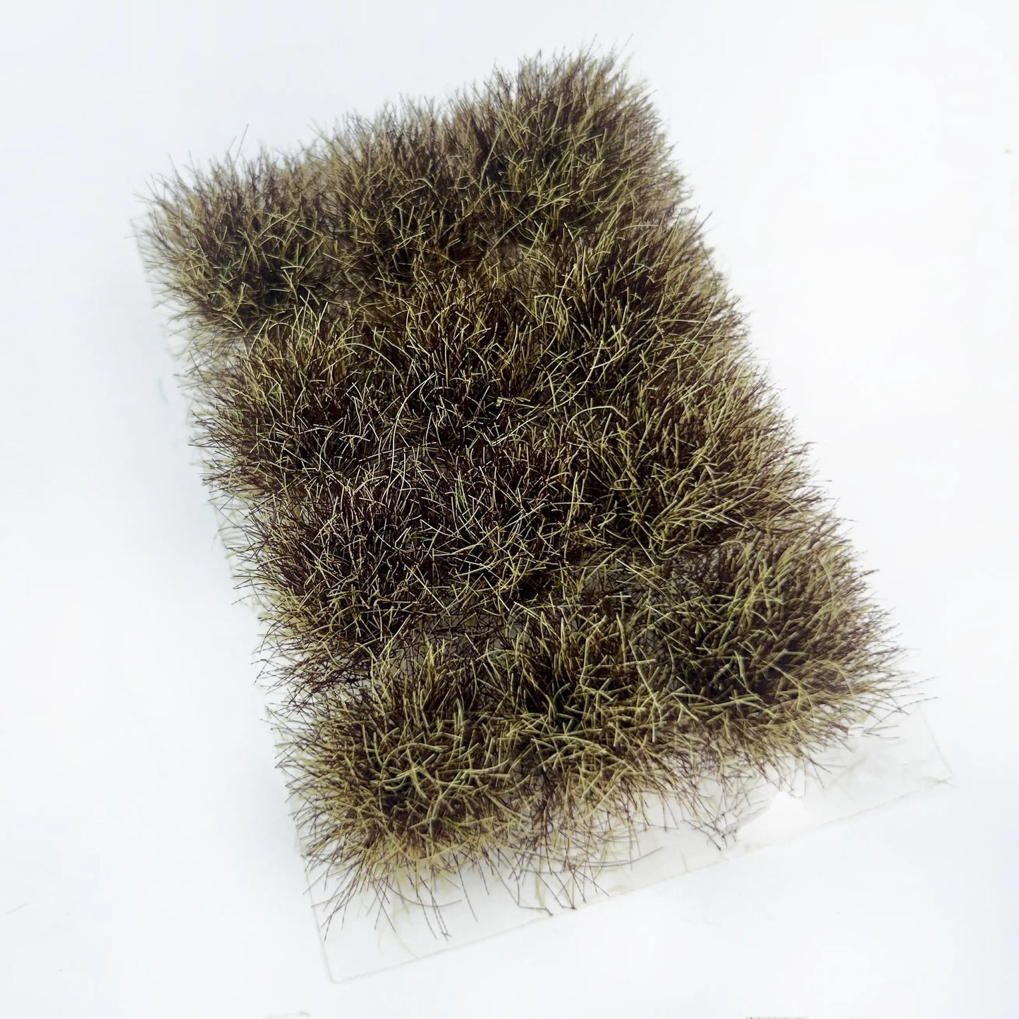 Self-adhesive dry brown miniature grass tuft mat with complete size measurements marked, for vintage wasteland diorama and wargame terrain craft reference