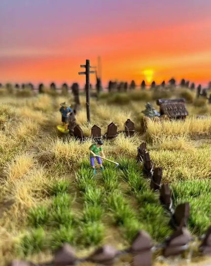 Rural farm miniature diorama scene with mixed dry & green static grass tufts, farmer figurines and wooden fence, marked with size measurements for terrain craft reference