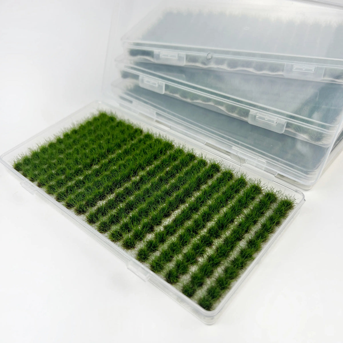 204 green grass tufts on an 8 by 16 centimetre sheet with product dimensions