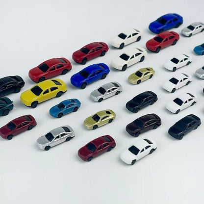 Full assortment multi color static miniature sedan model cars, plain white background display for scale diorama supplies