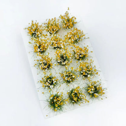 15 flower static grass tufts, mini model terrain, colorful wildflower turf, pure white background, sharp product shot