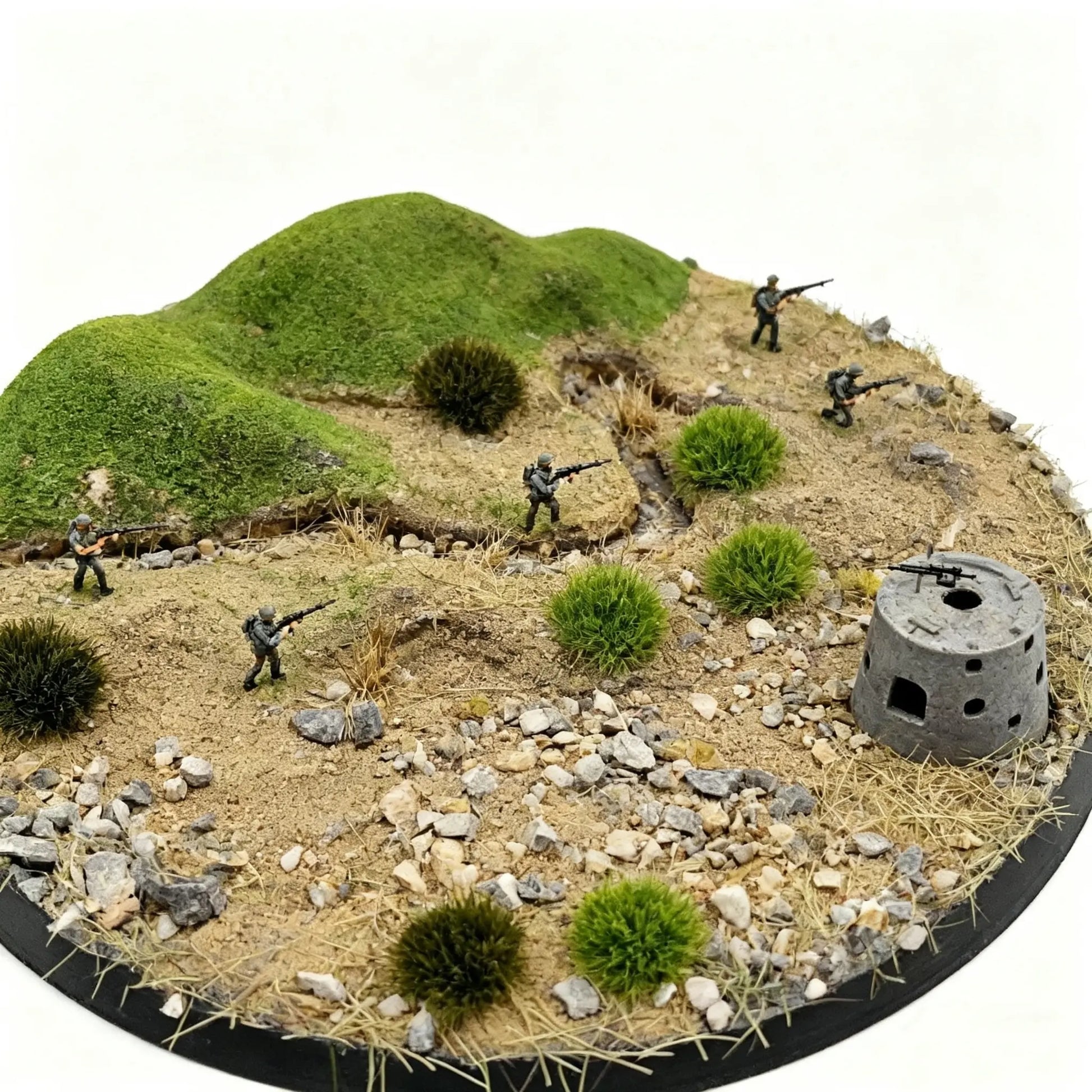 Round military infantry combat diorama base equipped with multi-tone self-adhesive static grass tufts, featuring rolling green hills, concrete pillbox, tiny soldier miniatures, gravel and dry grass, real scene display of miniature wargame terrain landscaping supplies