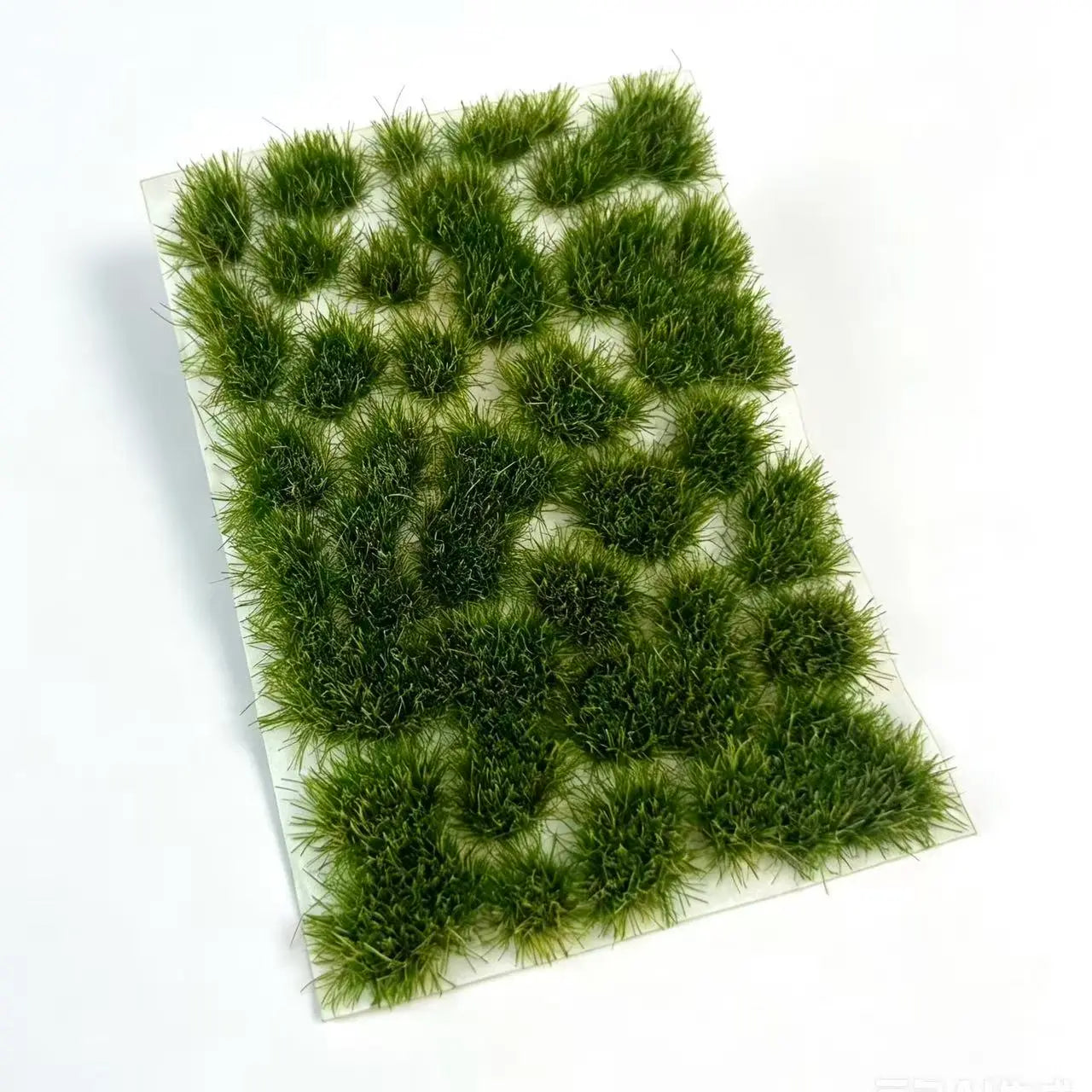 Realistic countryside railway diorama layout with fresh green & golden dry static grass tufts, matching miniature train models, ideal terrain decoration for railroad hobby scale model craft