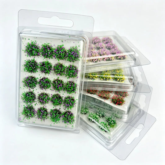 Self-adhesive miniature green grass tufts with purple flower flocks, pre-made shrub clusters blister pack, DIY diorama sand table warhammer terrain model scenery supplies