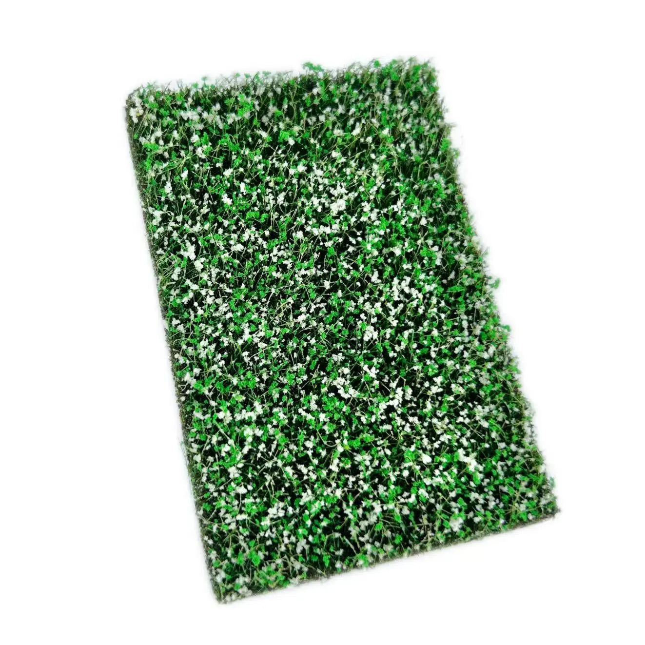 Rectangular artificial miniature grass mat with thick green grass and dense tiny bright red flowers, top full view for DIY diorama micro landscape terrain making
