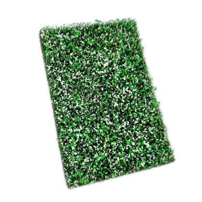 Rectangular artificial miniature grass mat with thick green grass and dense tiny bright red flowers, top full view for DIY diorama micro landscape terrain making