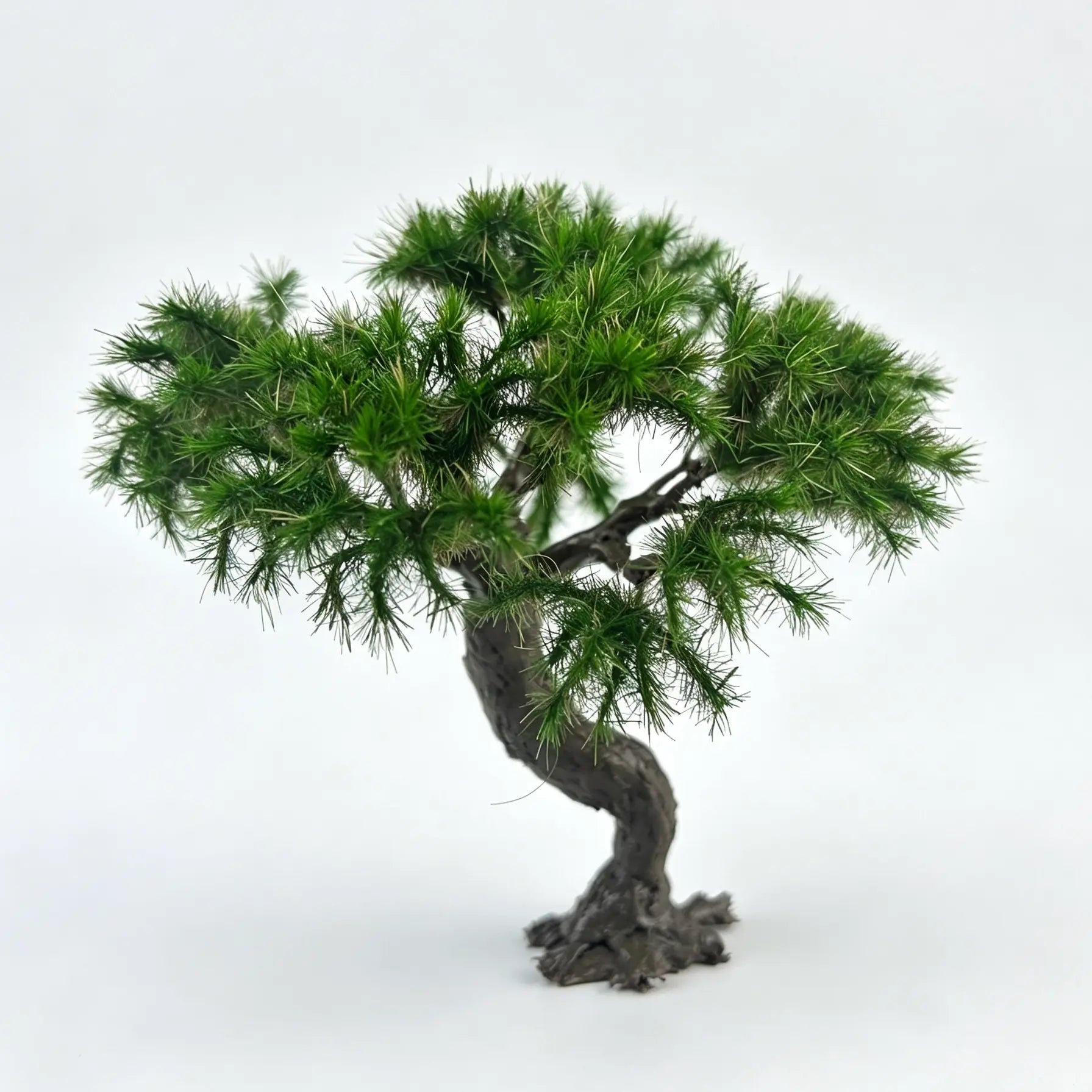 Handmade miniature twisted bonsai pine tree model for diorama railroad layout wargame terrain, sharp green pine needle foliage curved textured trunk with root base, white background product shot