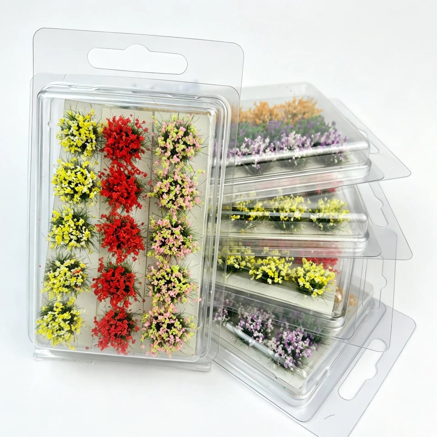 Size comparison of red yellow pink mini flower clusters with scale figure, marked package dimension 9cm*6cm, tweezers for operation display
