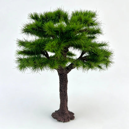 Handmade miniature pine tree model for railway layout diorama wargame terrain, realistic green needle foliage textured trunk with root base, white background product shot
