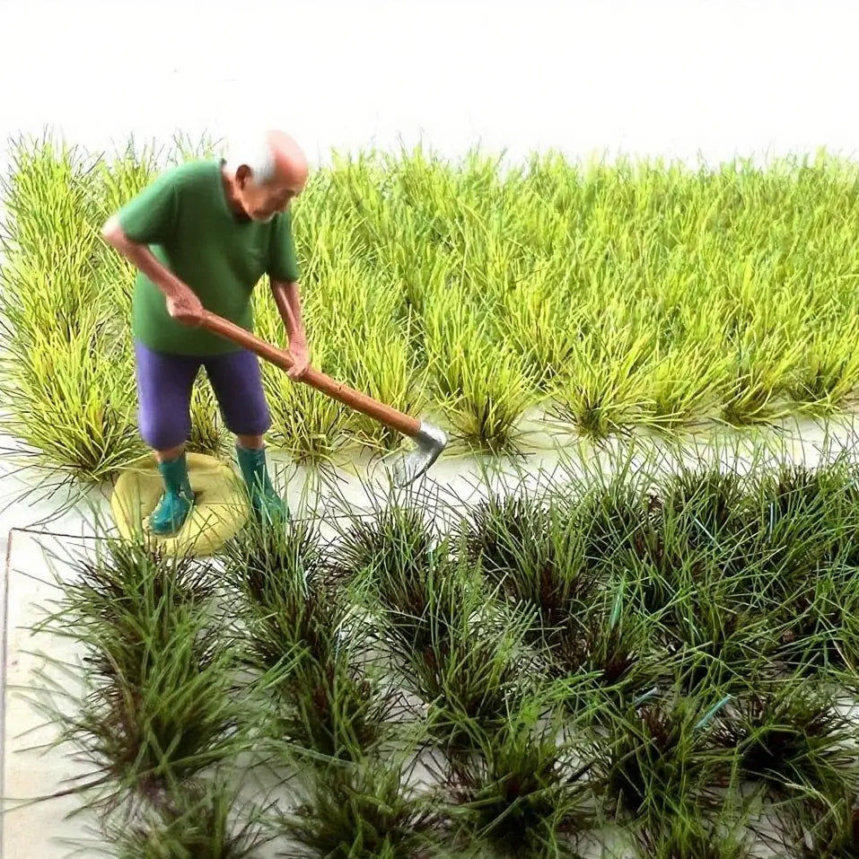 Realistic miniature farm field diorama scene built with self-adhesive seasonal tuft grass sheets, countryside landscape showcase for farmer miniatures, rural scale model terrain layout
