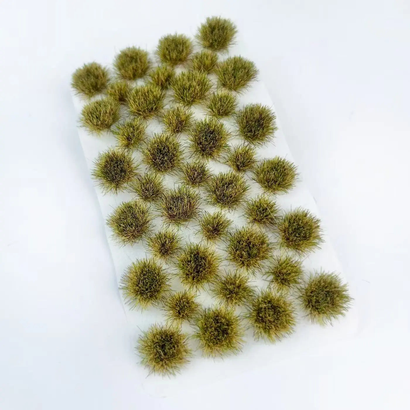 Warm autumn yellow mixed light brown dry static tuft grass mat with soft withered grass texture, realistic fall wilderness terrain supply for soldier miniatures and military model base building
