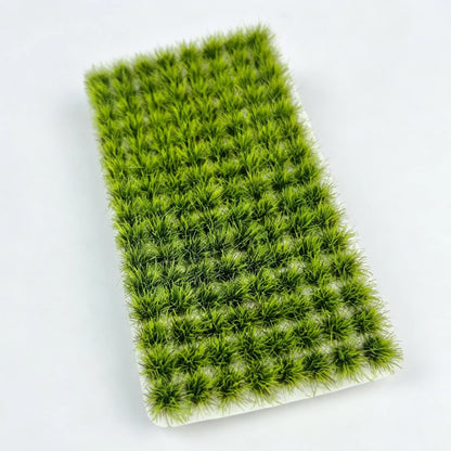 Countryside train diorama landscape with mixed static grass clumps, natural miniature vegetation decor for scale model hobby