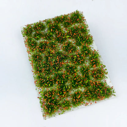 Blister packaged multi-color static grass tufts sheet retail display with assorted seasonal tone grass mats, self-adhesive realistic static grass mat miniature terrain packs for scale model building, wargame tabletop base, railway layout scenery and diorama craft hobby supplies