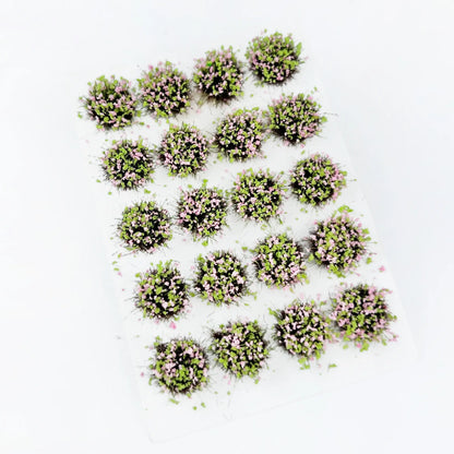 Soft pale green round self-adhesive static grass tuft sheet with delicate light pink wild flower clusters, romantic garden mini foliage clumps for cottage diorama base, fantasy wargame terrain and HO/N scale model railroad landscaping craft