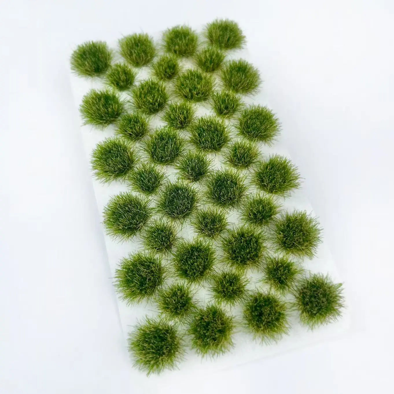 Mixed olive green and pale yellow static tuft grass sheet with natural autumn gradient color, self-adhesive model grass mat for realistic hillside wilderness, war gaming terrain and diorama base decoration