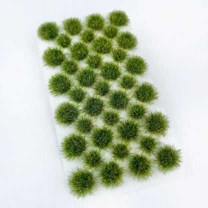 Mixed olive green and pale yellow static tuft grass sheet with natural autumn gradient color, self-adhesive model grass mat for realistic hillside wilderness, war gaming terrain and diorama base decoration