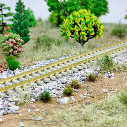 N scale model railway layout scenery decorated with realistic static grass tufts, hobby terrain building supplies