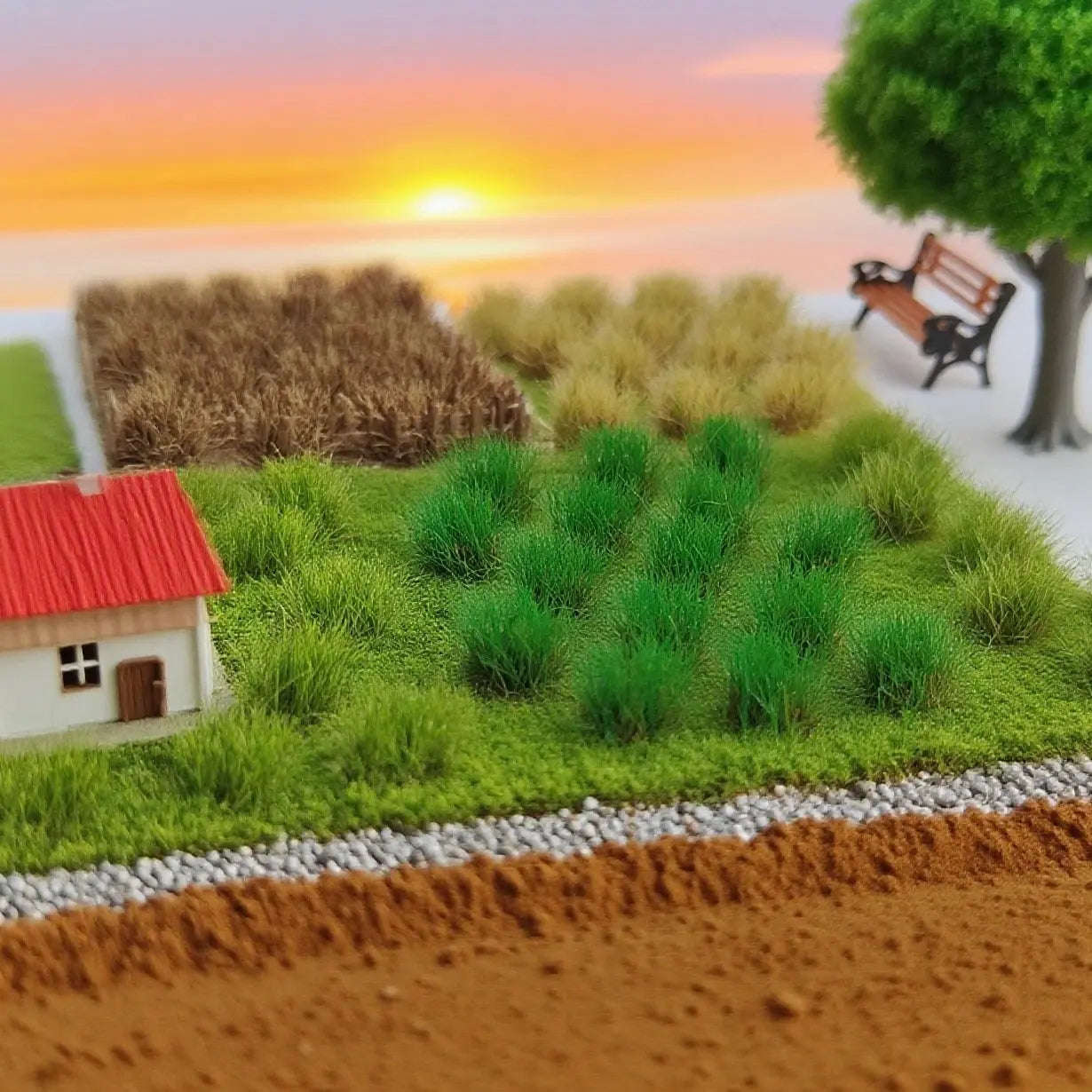 Realistic countryside village finished diorama layout decorated with multi-tone self-adhesive static grass tufts, miniature red roof house, tree and park bench, natural rural landscape for scale railroad and wargame terrain display