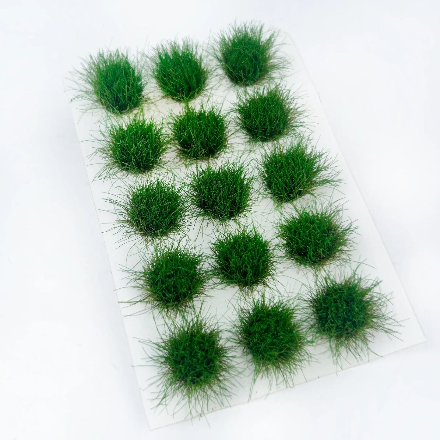 Dry light beige static grass tufts, autumn miniature terrain decor, withered grass clump sticker sheet, pure white background, sharp texture details