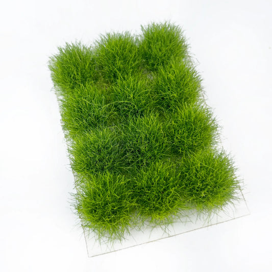 Self-adhesive bright lime green miniature grass tuft mat with full size measurements marked, for fresh natural landscape diorama and wargame terrain craft reference
