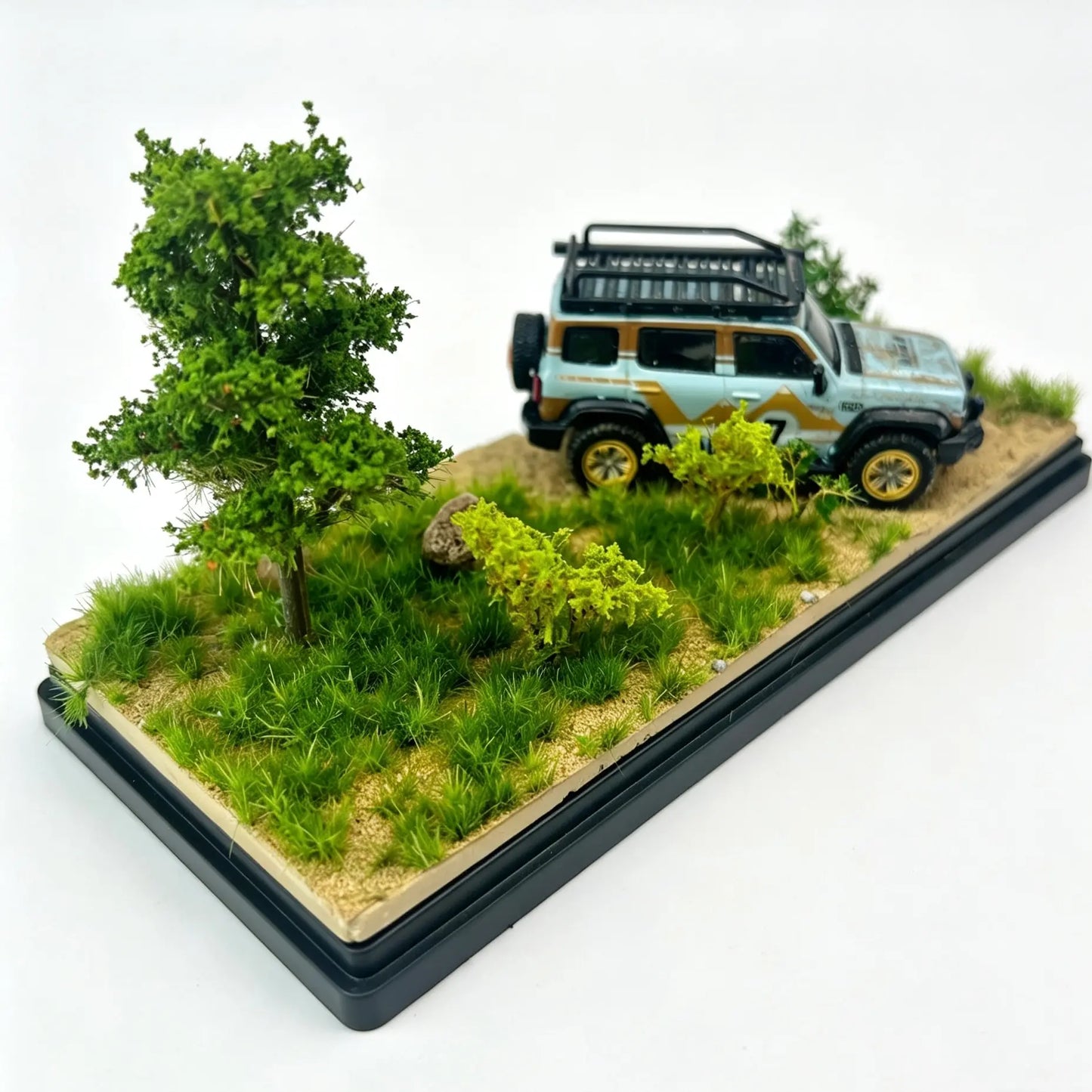 Clear acrylic dust cover display box matched with spring green forest diorama, lush static grass and mini pine trees for 1:64 off-road model car